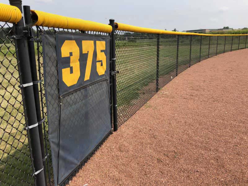 Chain link fence on baseball field